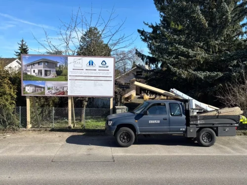 Pose professionnelle, découpe, impression d'un panneau de chantier personnalisé à Genève par stick-up.ch