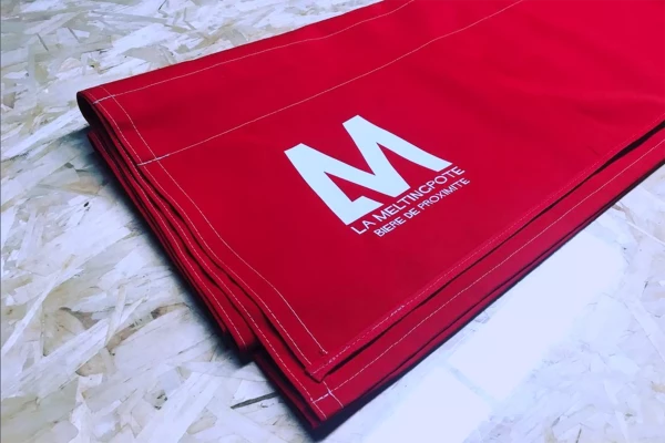 fabrication de volant de store publicitaire rouge